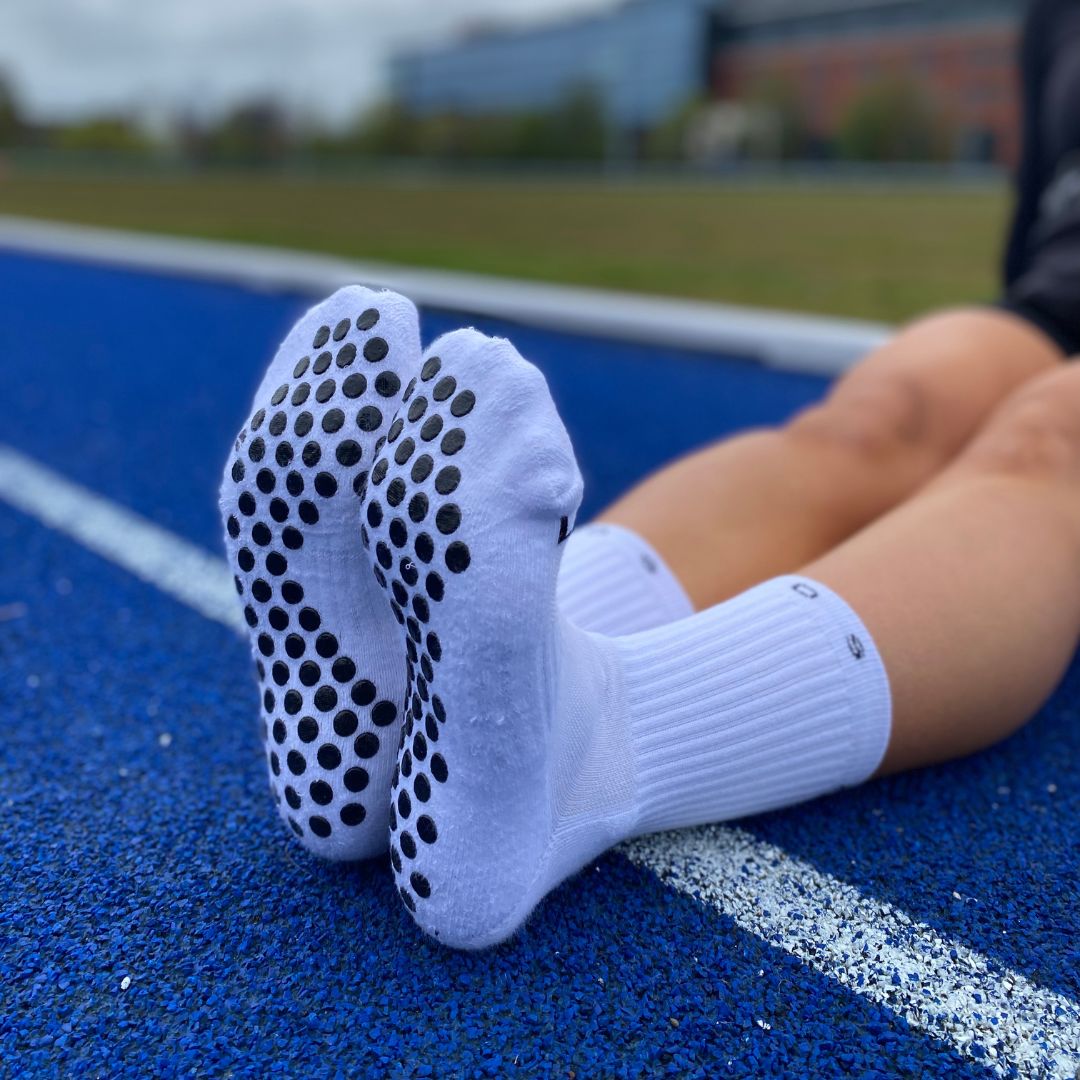 Transform your game with the right footwear : The science behind grip socks