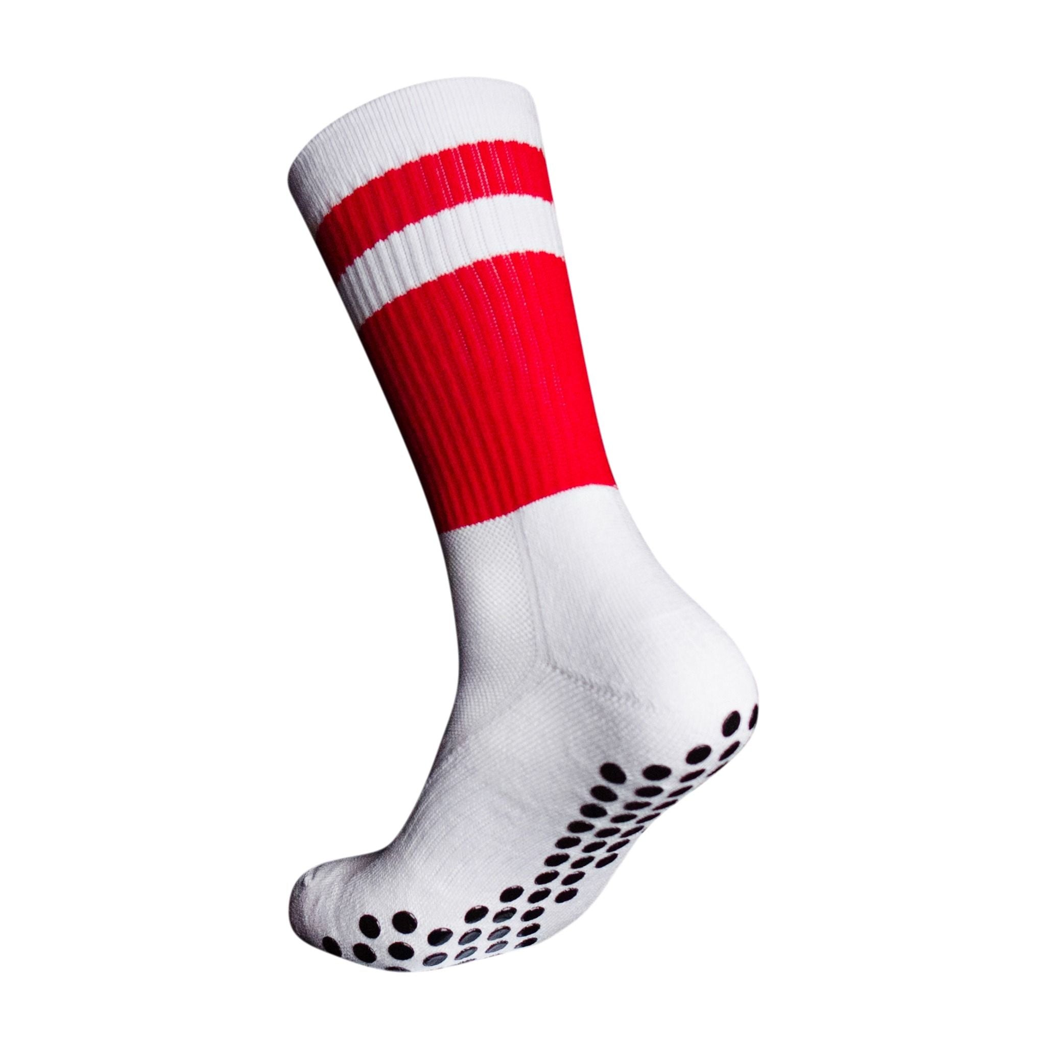 A side profile of the red and white Ultrasoft grip sock from Eos Elite that shows the silicon grips that secure fit and stops blisters and breathable material