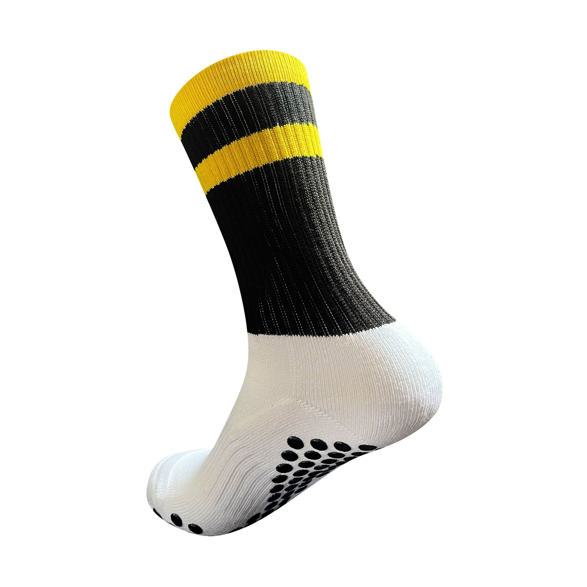 A side profile of an Eos Elite Ultrasoft grip sock in white and black with yellow stripe clearly shows the elasticated, breathable material and silicon grip pads on the base of the sock.