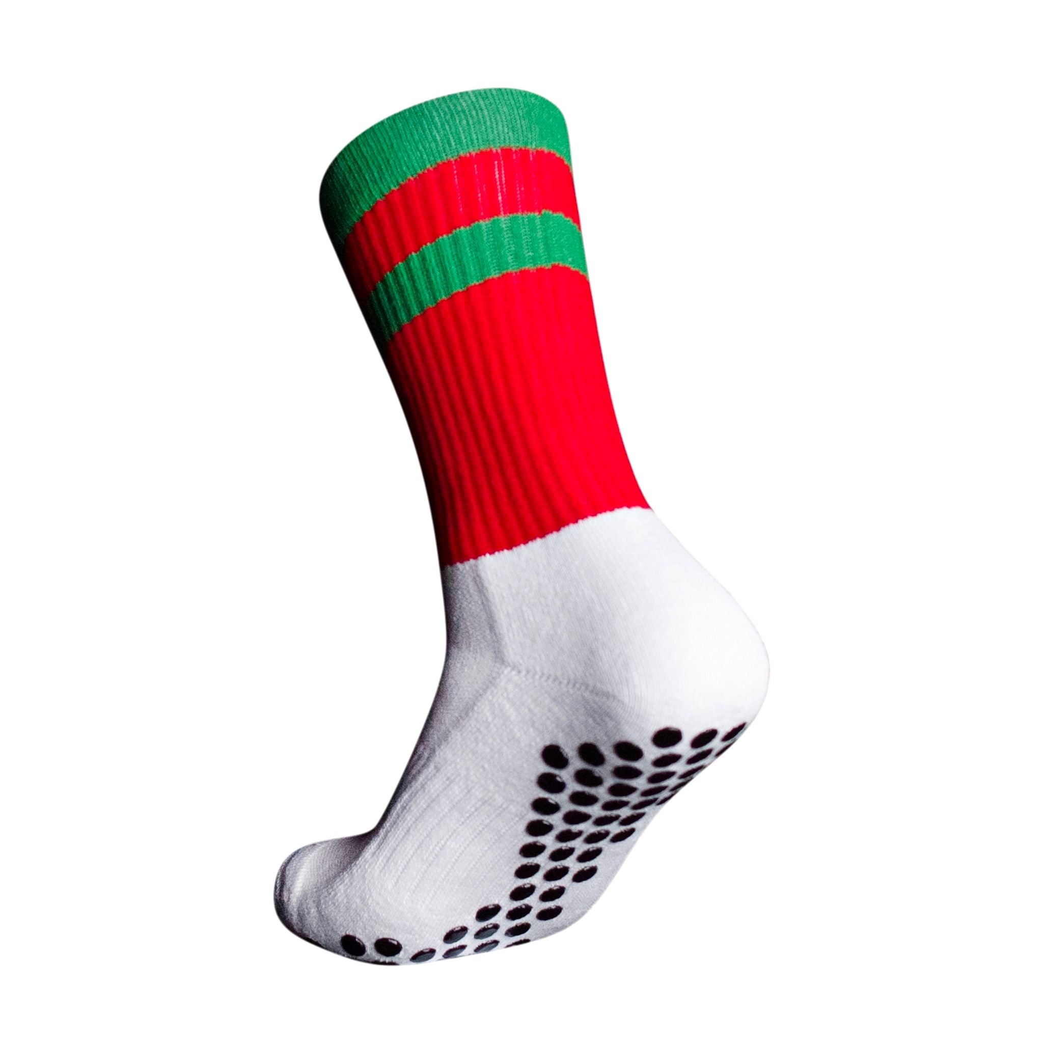 A side profile of an Eos Elite Ultrasoft grip sock in white and red with green stripe clearly shows the elasticated, breathable material and silicon grip pads on the base of the sock.