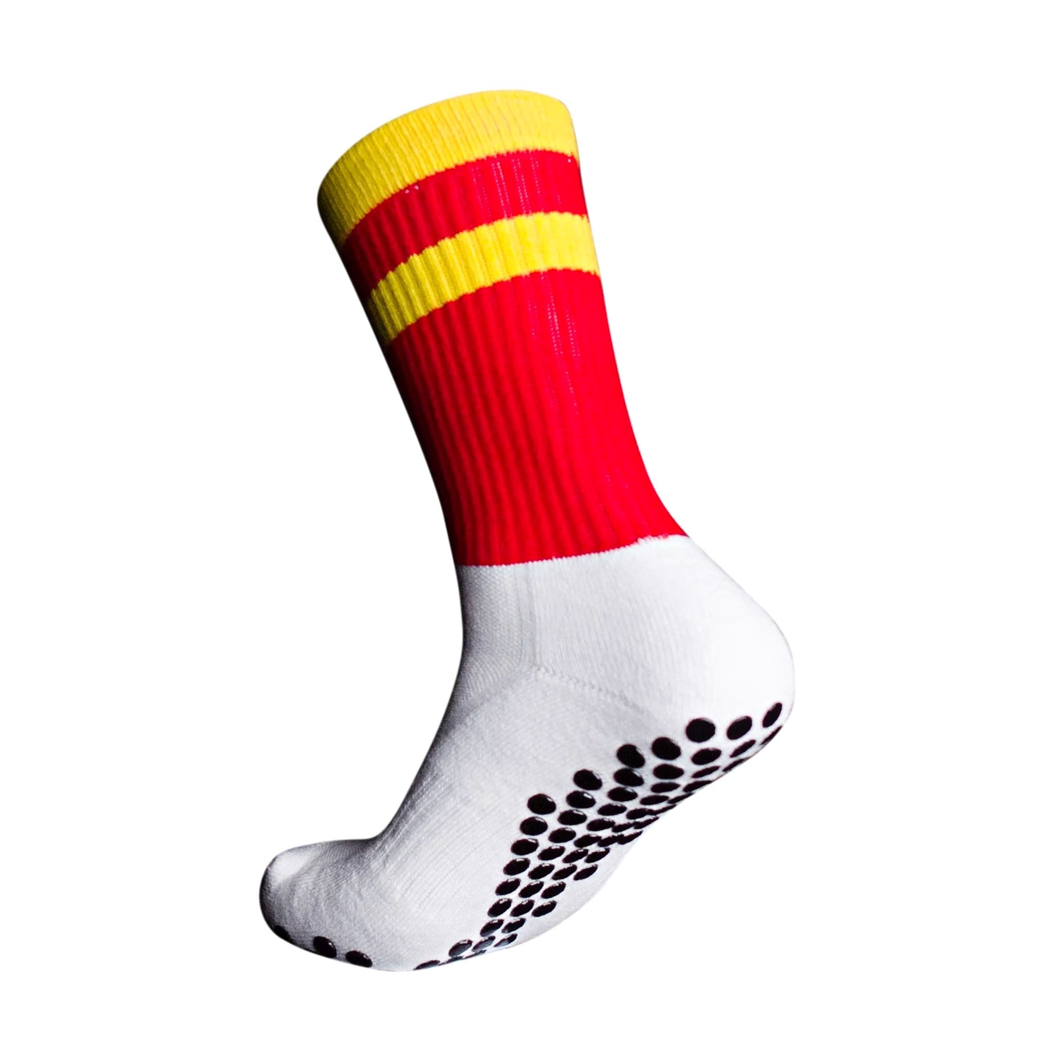 A side profile of an Eos Elite Ultrasoft grip sock in white and red with yellow stripe clearly shows the elasticated, breathable material and silicon grip pads on the base of the sock.