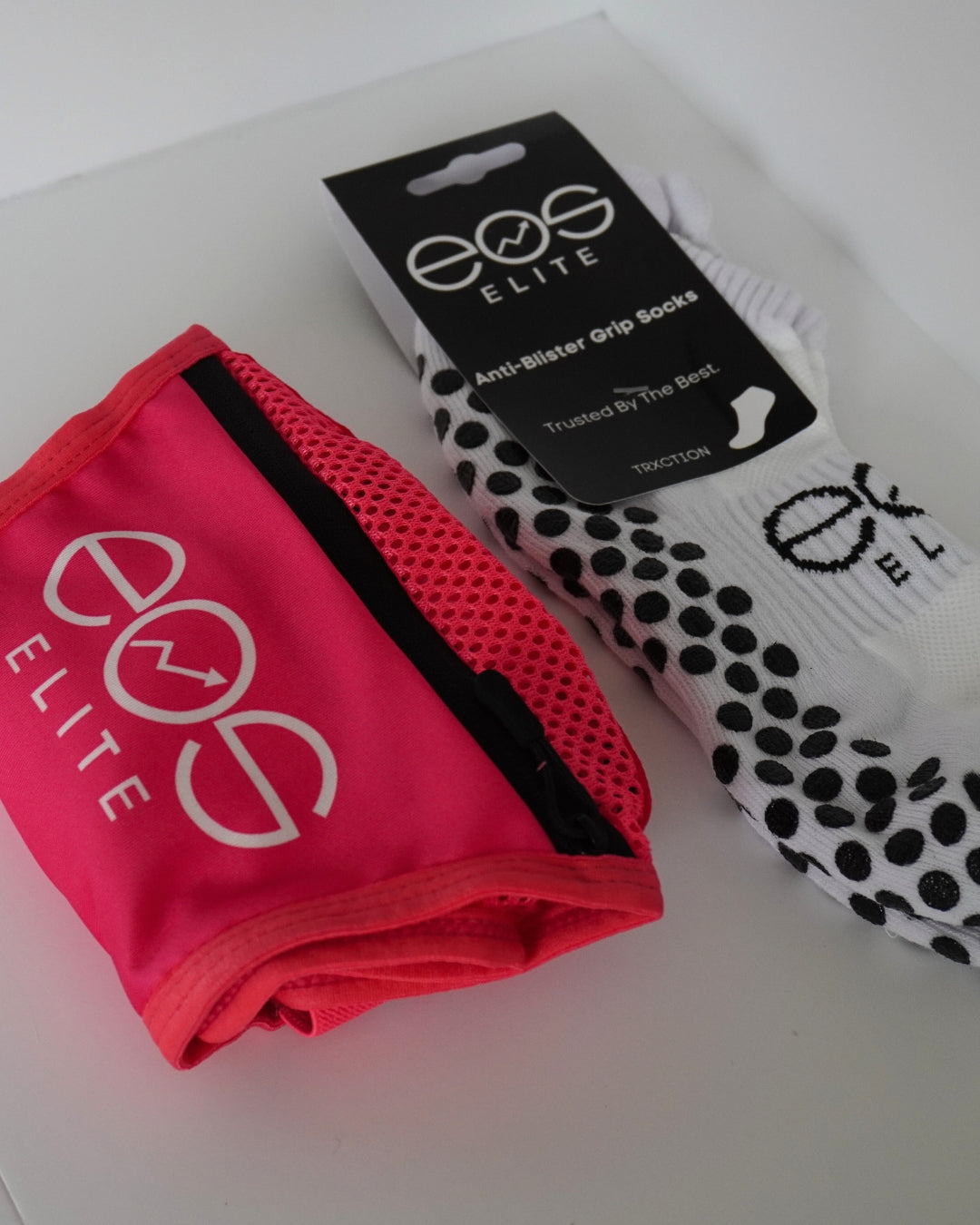 Designed in Ireland for runners who demand performance and simplicity, the Eos Pink Runners Bundle combines the UltraLight weight, 135g Eos Elite Running Vest with a 700ml Water Bladder for seamless hydration on the go. With adjustable straps for a secure fit and smart storage for your essentials, this bundle is perfect for both trail and road running. The water bladder’s soft outer shell fits perfectly into the vest, keeping you comfortable, fuelled, visible and focused on your run.

What's included?

An E
