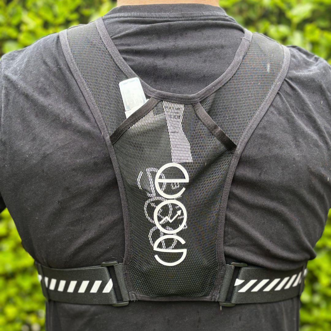 Black running vest from the back holding 500ml Eos Elite water bladder 