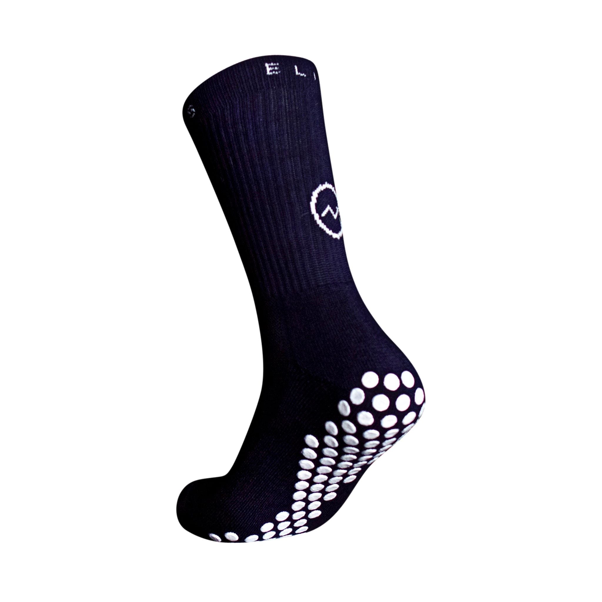 A side profile of an Eos Elite Eos 1 Ultrasoft grip sock in navy clearly shows the elasticated, breathable material and silicon grip pads on the base of the sock.